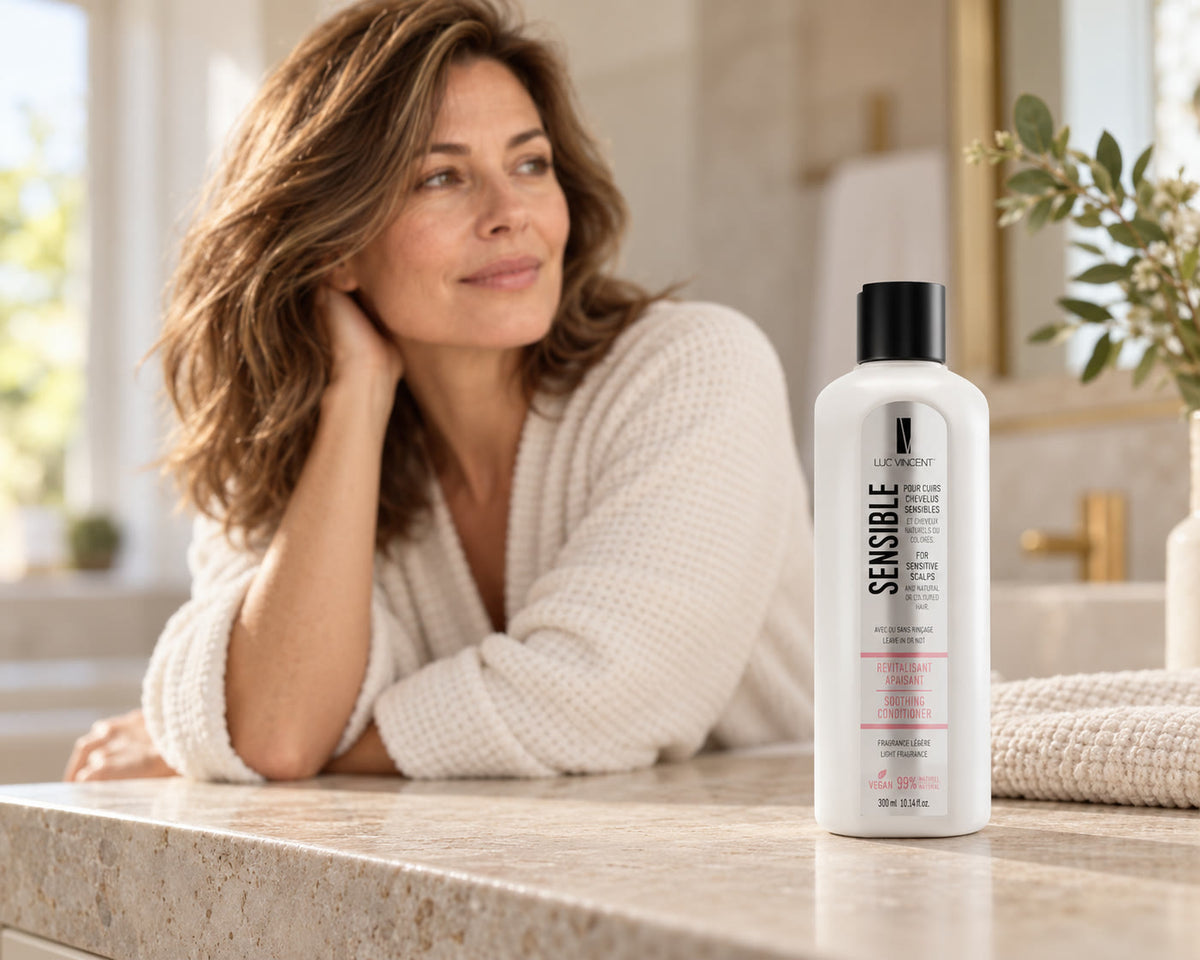 Femme aux cheveux soignés avec le produit Luc Vincent