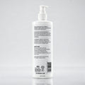 Revitalisant Traitant 500 ml, vue de dos avec les instructions et le code-barres, fond gris studio